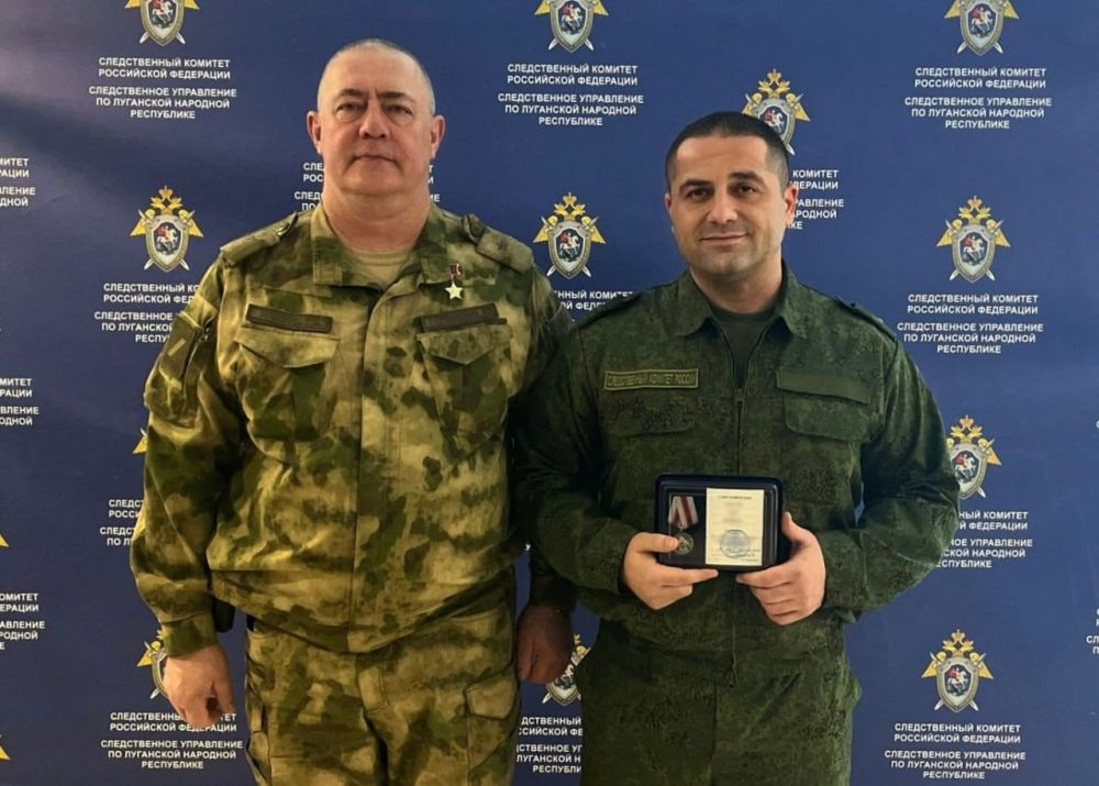 Офицеры центрального аппарата Следственного комитета России посетили Донецкую и Луганскую народные республики Офицеры центрального аппарата Следственного комитета России посетили Донецкую и Луганскую народные республики