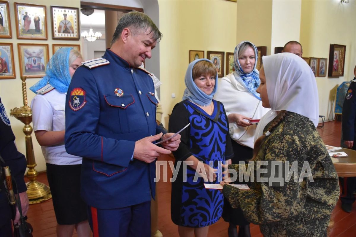 В Свято-Николаевском храме Брянки состоялось торжественное посвящение в казачество В Свято-Николаевском храме Брянки состоялось торжественное посвящение в казачество